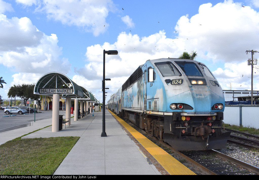 Miami Airport bound Tri-Rail train about to stop at Hialeah Market Station